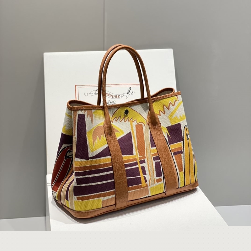 H**mes shopping bags